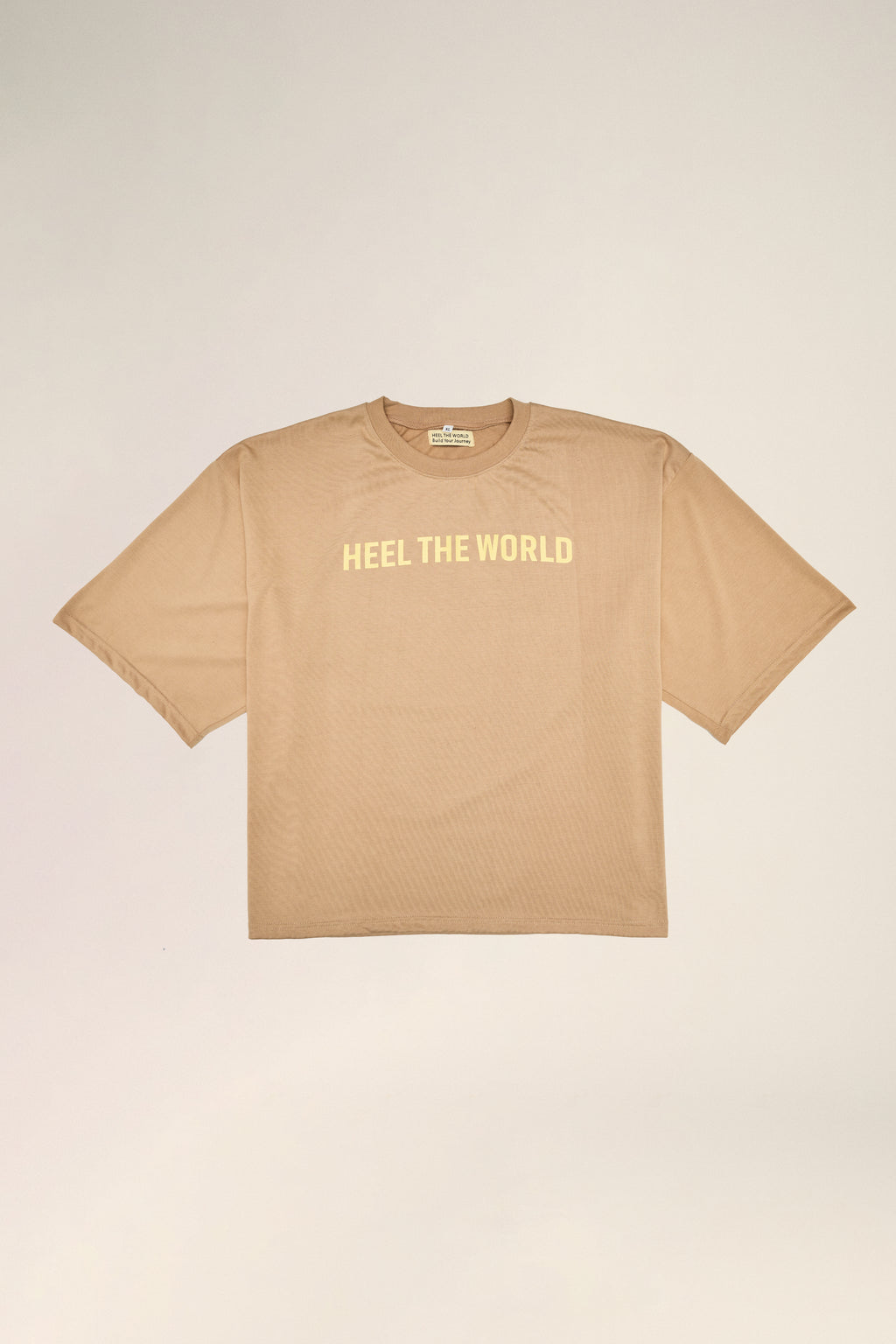 HEEL THE WORLD OVERSIZED BOX CUT TEE (WORDY)